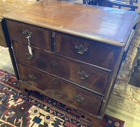 An early 18th century walnut chest fitted two short drawers and two long drawers, width 81cm, depth 53cm, height 80cm
